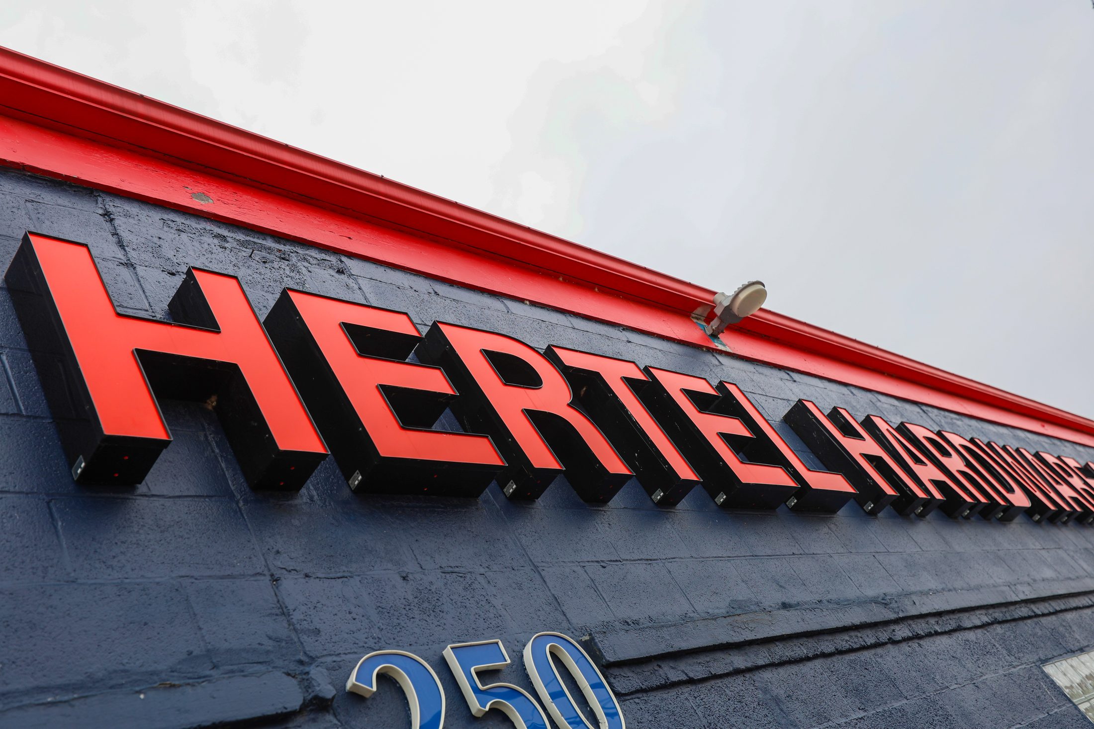 The Hertel Hardware and Plumbing sign on the Ramsdell Avenue building